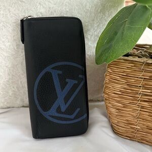 Louis Vuitton Black Leather Zip Wallet with Blue LV Logo. Dust bag included!